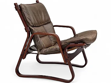 Anni '70, poltrona lounge norvegese, mobili in pelle marrone.