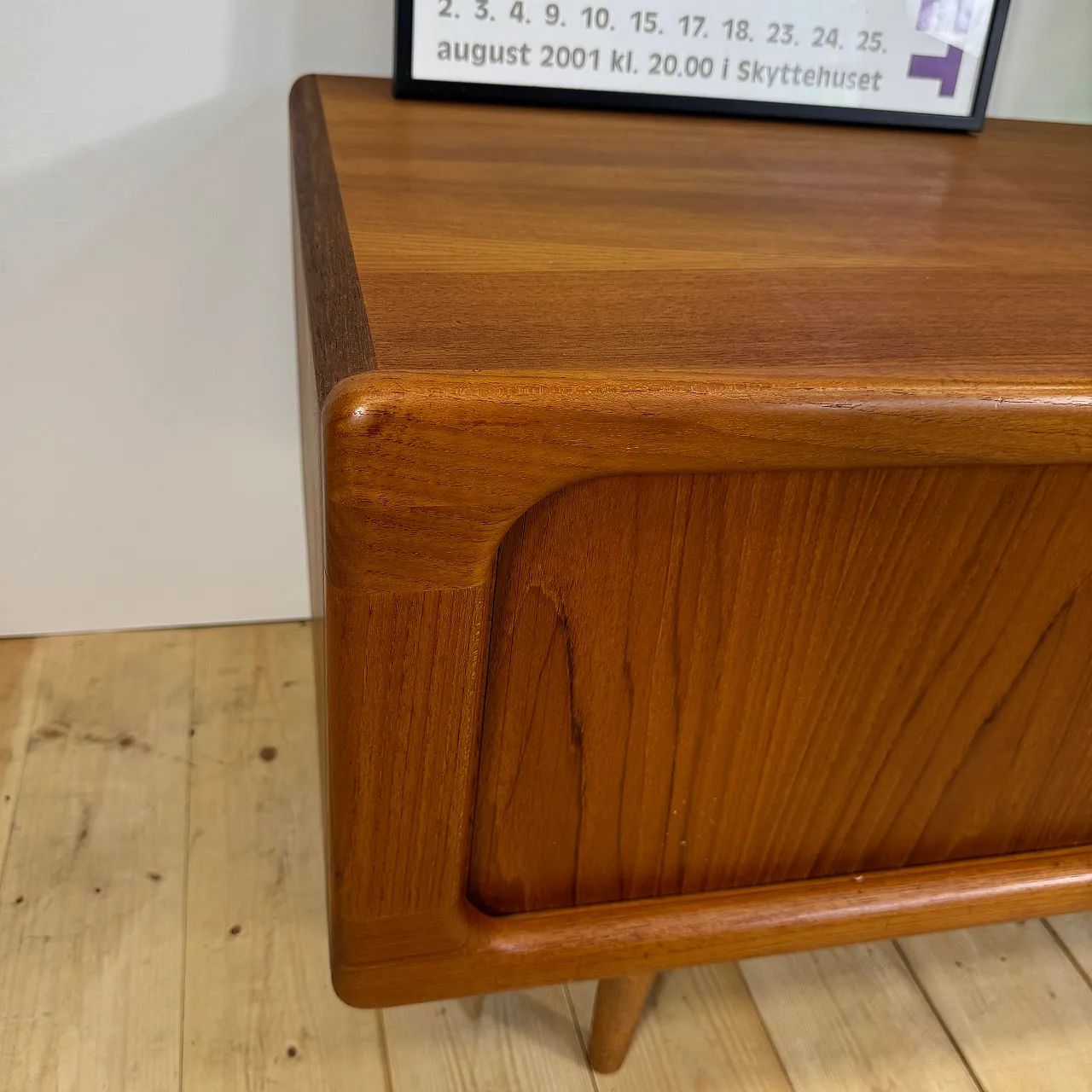 Dyrlund low teak sideboard with retractable doors, 1960s 3