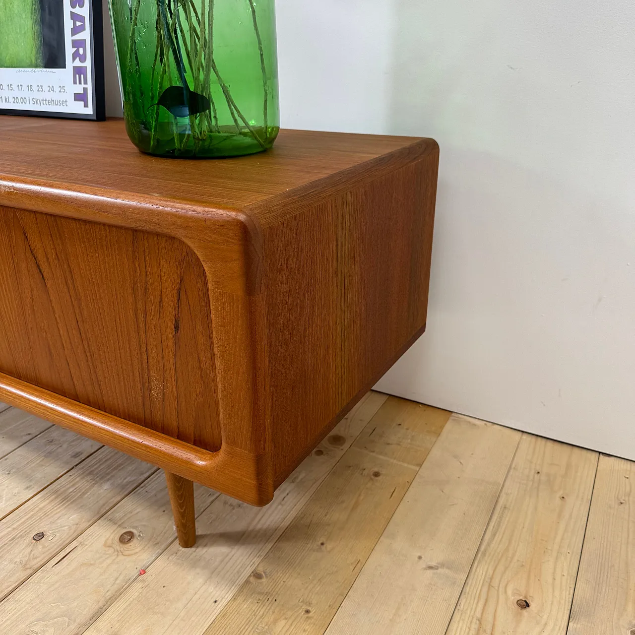 Dyrlund low teak sideboard with retractable doors, 1960s 7