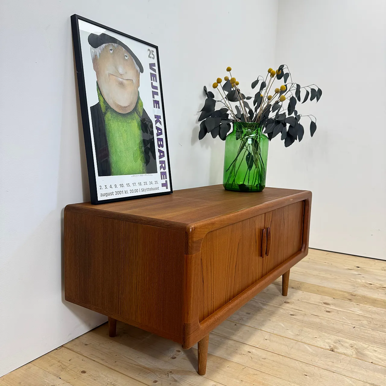 Dyrlund low teak sideboard with retractable doors, 1960s 8
