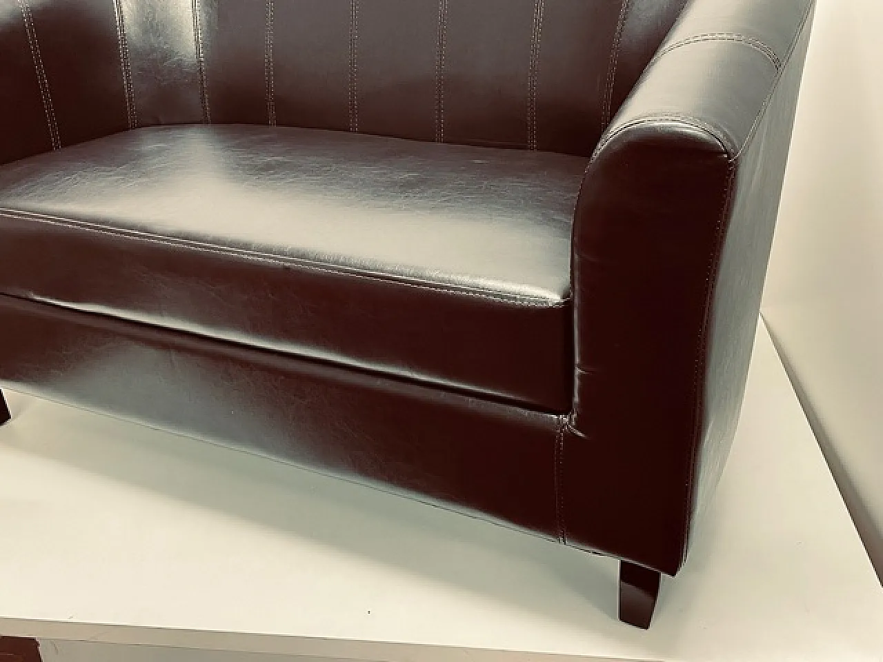 Two-seater sofa, in brown skay, 70s 2