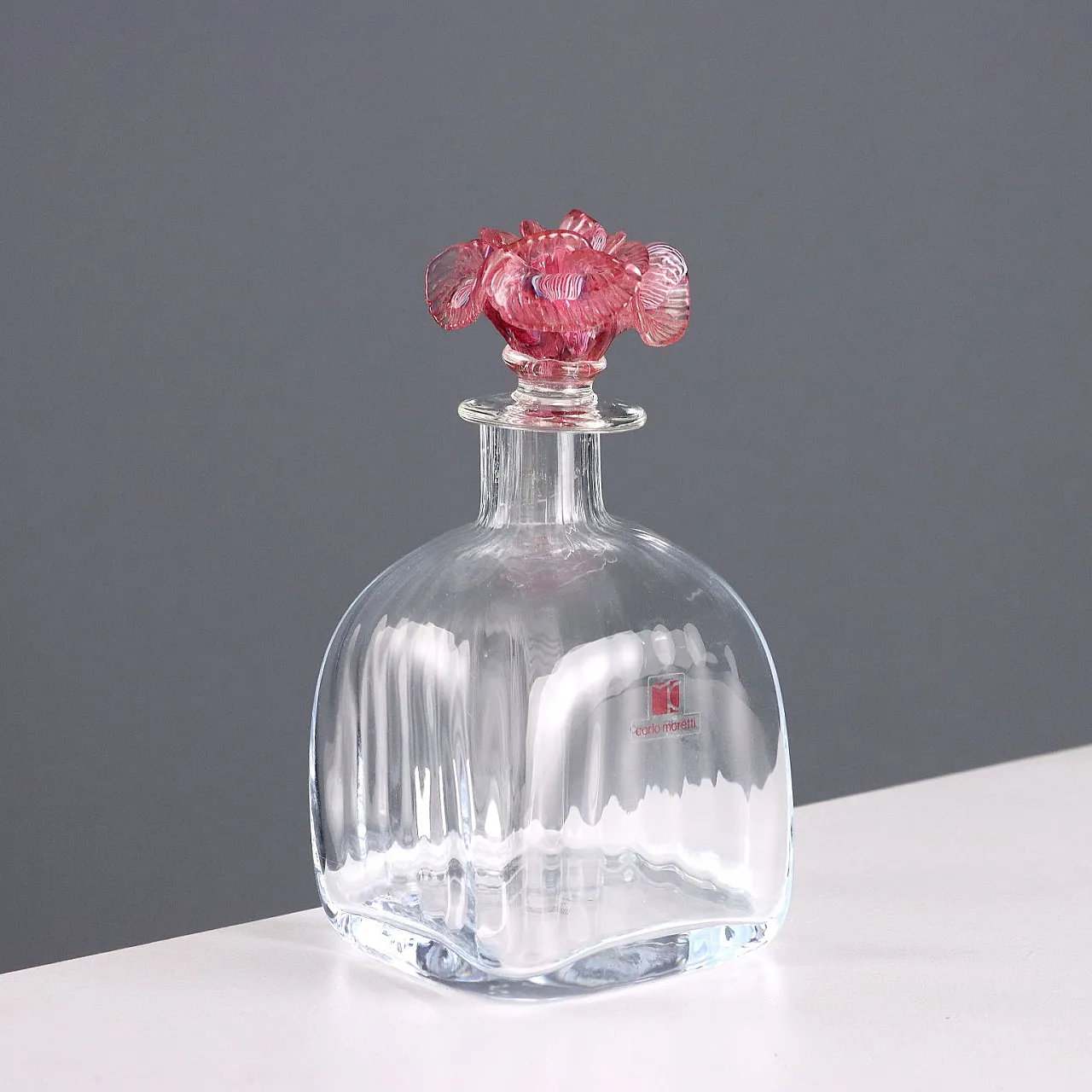 Ribbed blown glass bottle with rose-shaped cap, 20th century 1