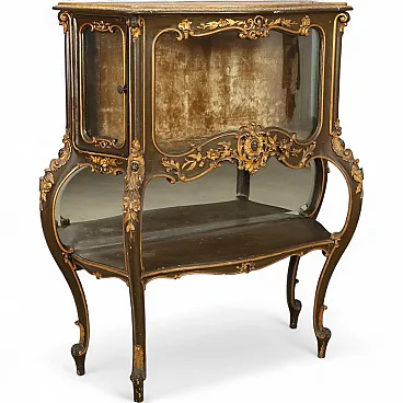 Carved and lacquered Baroque style showcase, 19th century
