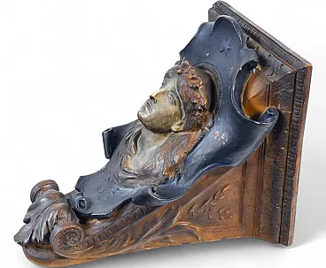 Mensola in terracotta scolpita e dipinta con volto di donna, '800