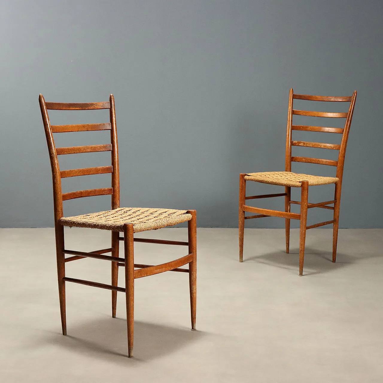 Pair of chairs in wood and woven rope, 1950s 1