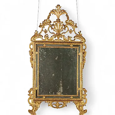 Wall mirror in carved and gilded wood, 18th century