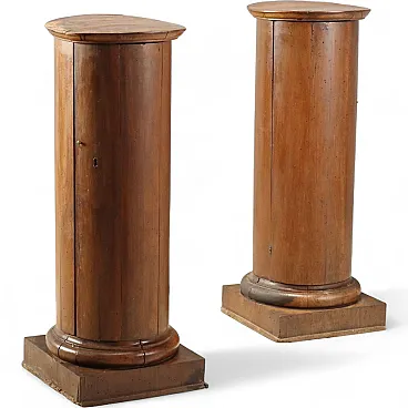 Pair of Empire column bedside tables in walnut, 19th century