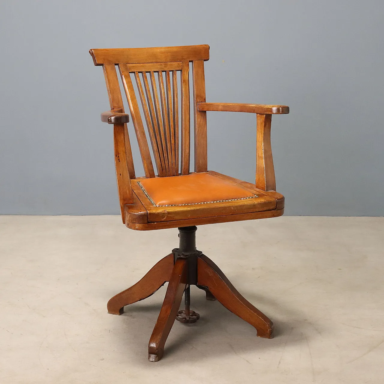Swivel walnut armchair with open backrest, late 19th century 1