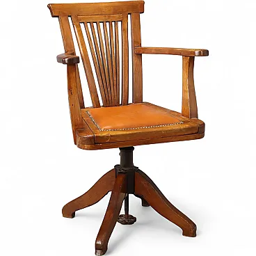 Swivel walnut armchair with open backrest, late 19th century