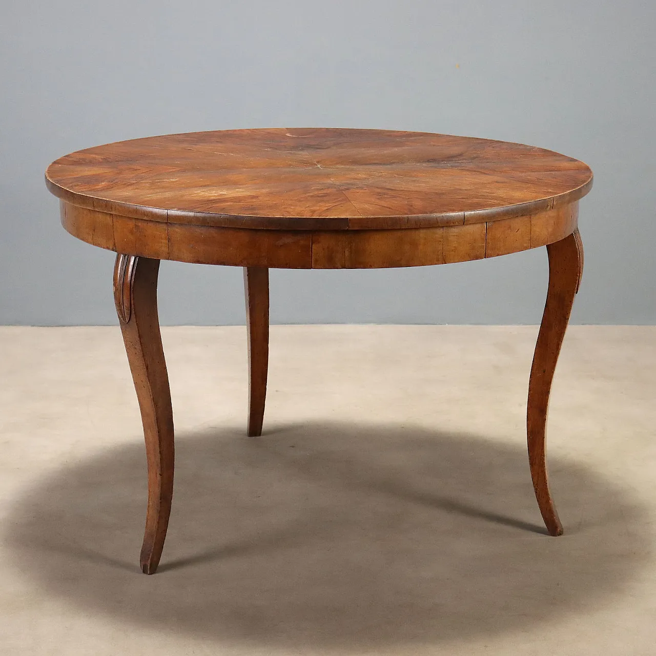 Round table with drawer and wavy legs, 19th century 1