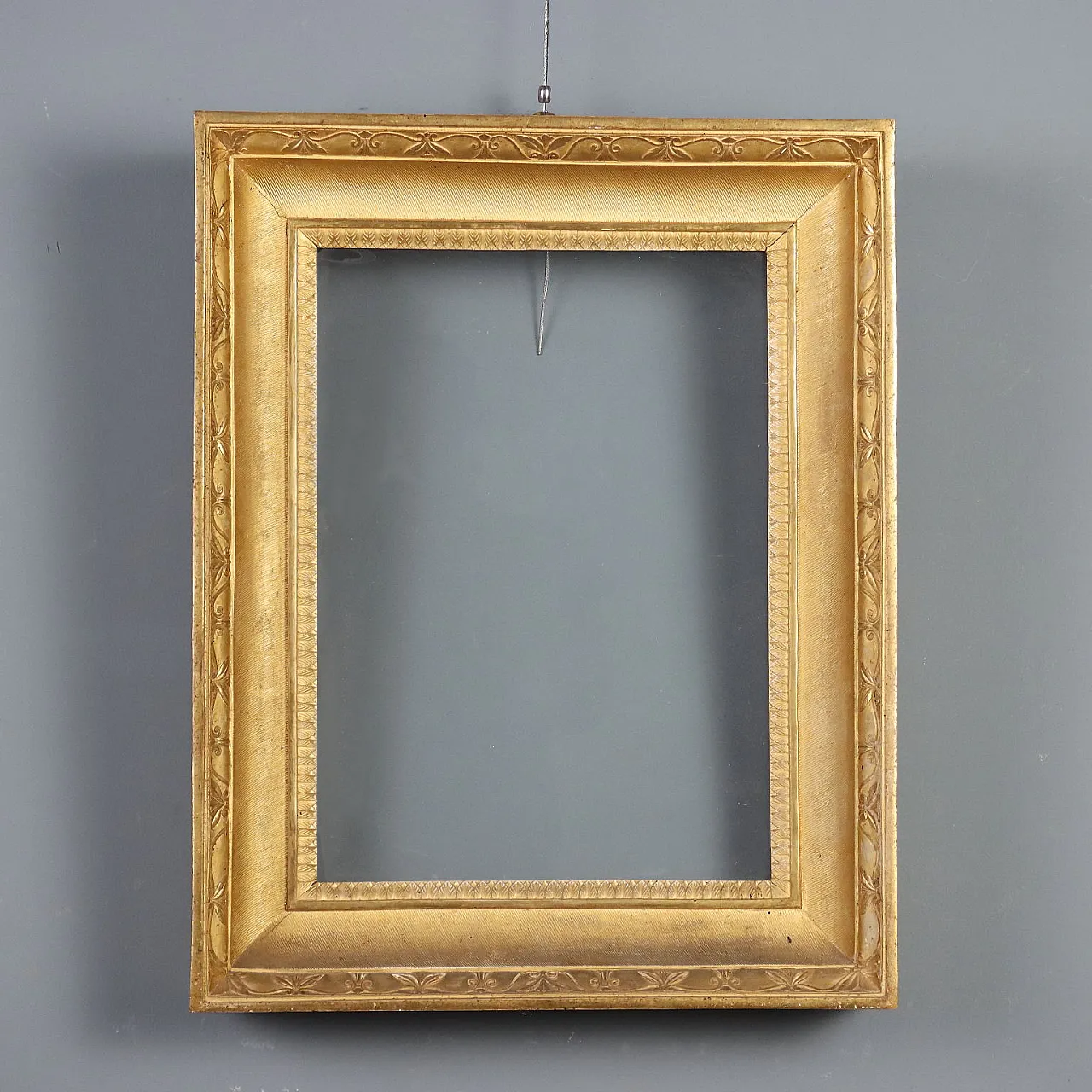 Empire frame in carved and gilded wood, early 19th century 1