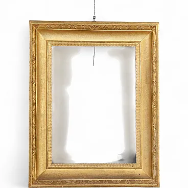 Empire frame in carved and gilded wood, early 19th century