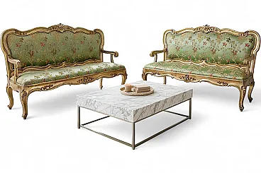 Pair of Louis XV style carved and gilded wooden sofas, 20th century