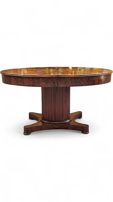 Empire oval table veneered in walnut, early 19th century