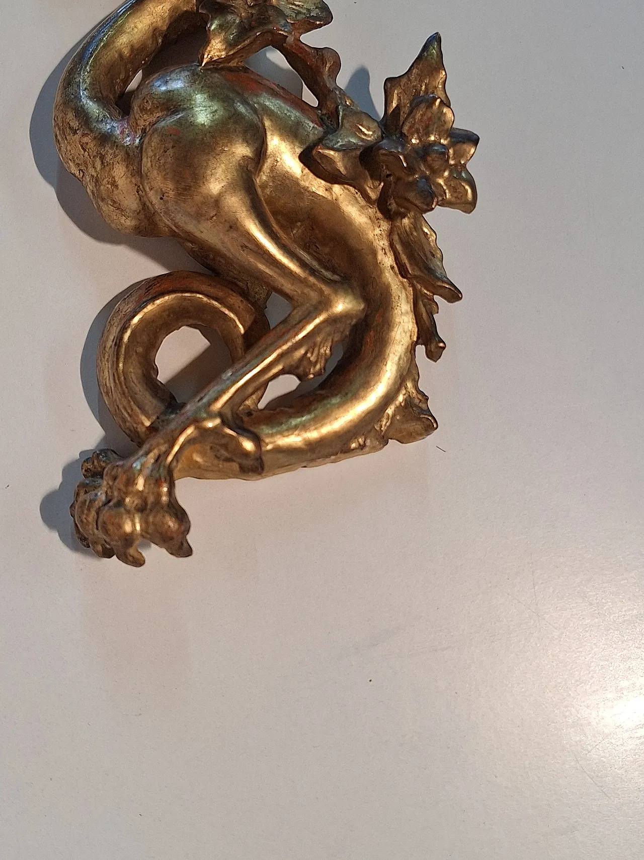 Pair of decorative elements in the shape of winged dragons, 19th c. 1