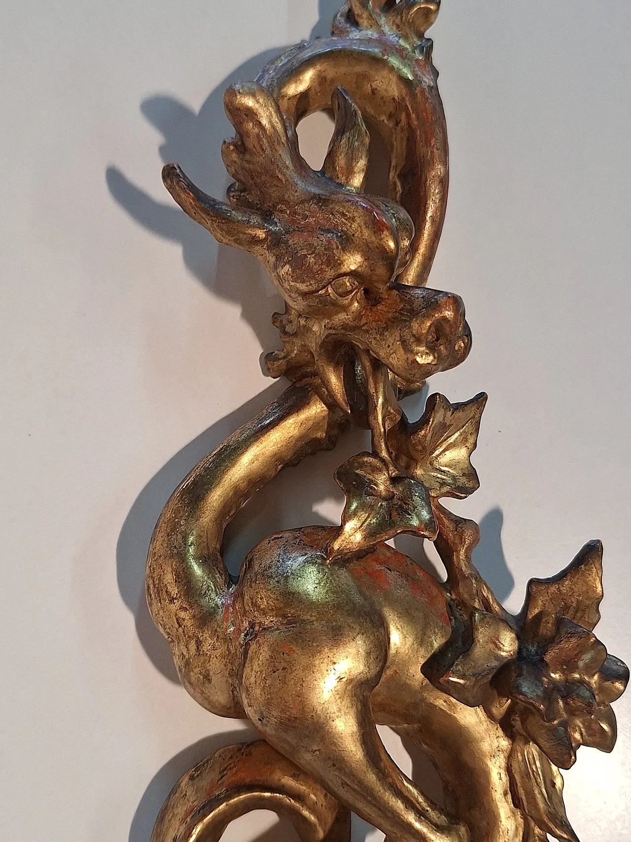 Pair of decorative elements in the shape of winged dragons, 19th c. 2
