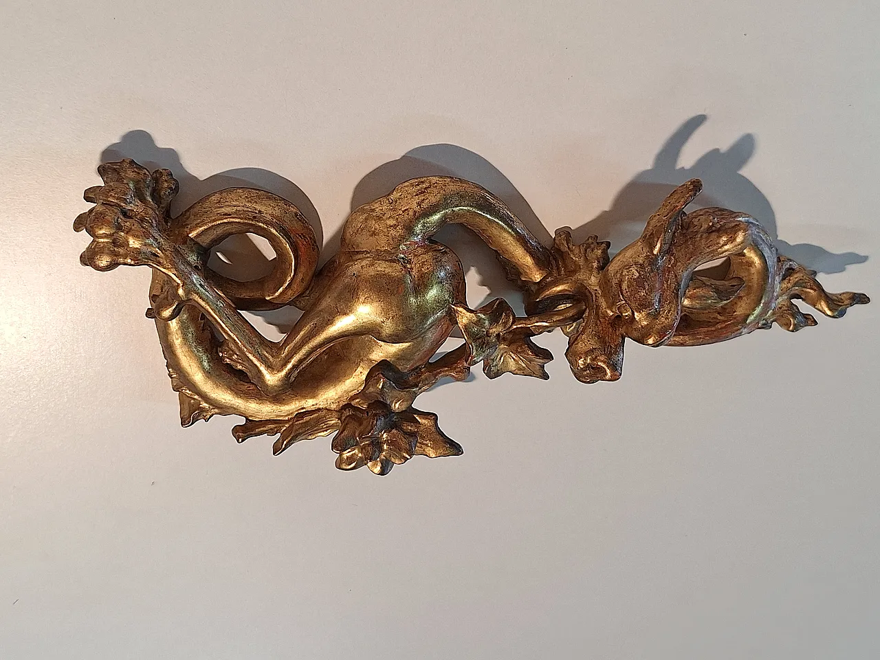 Pair of decorative elements in the shape of winged dragons, 19th c. 5
