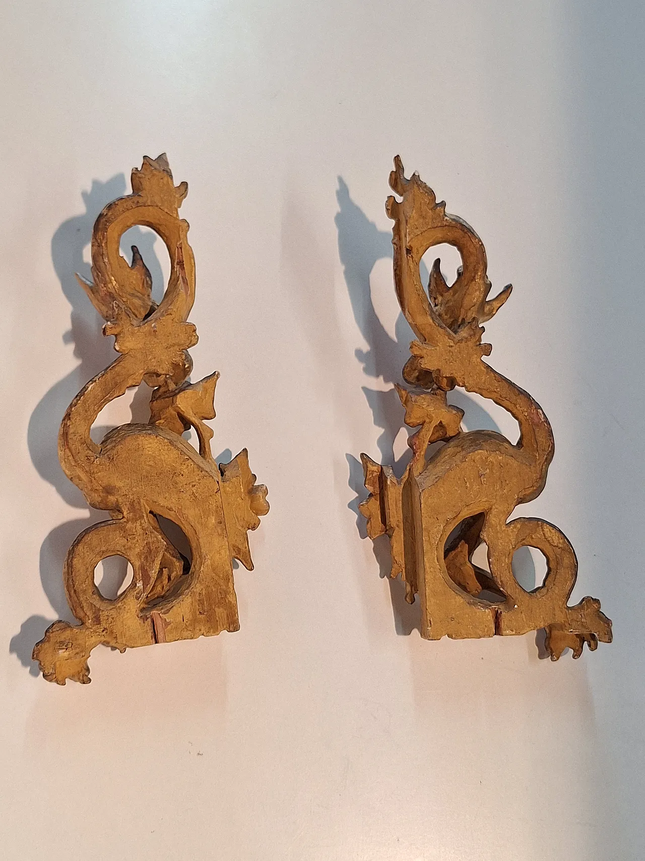 Pair of decorative elements in the shape of winged dragons, 19th c. 12