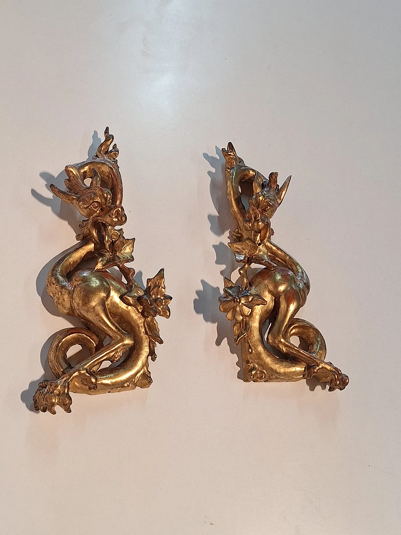 Pair of decorative elements in the shape of winged dragons, 19th c. 13