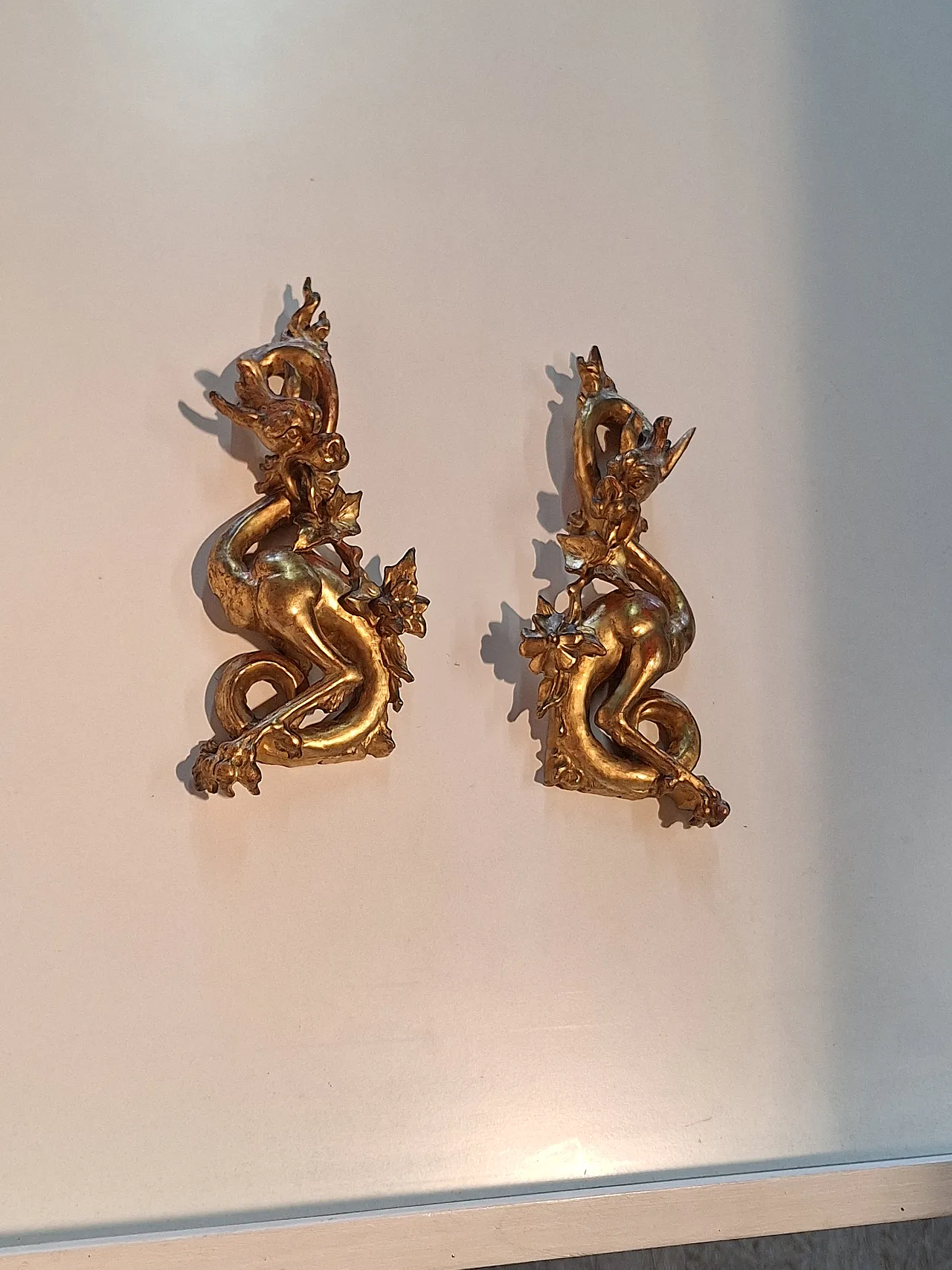 Pair of decorative elements in the shape of winged dragons, 19th c. 15