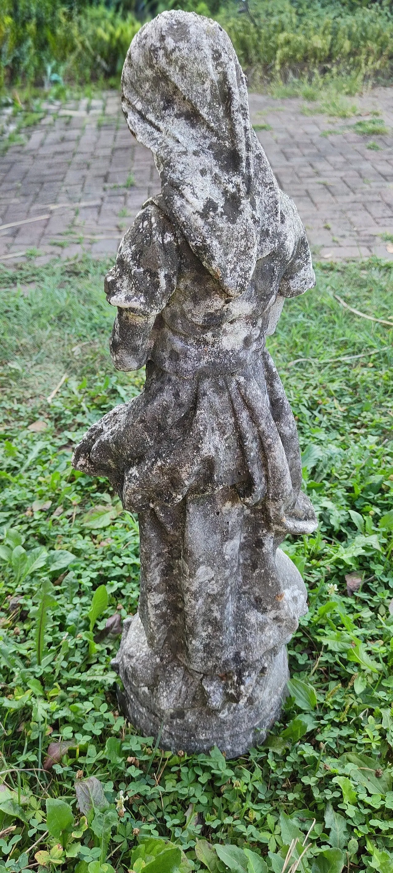 Statue with column, 1960s 9