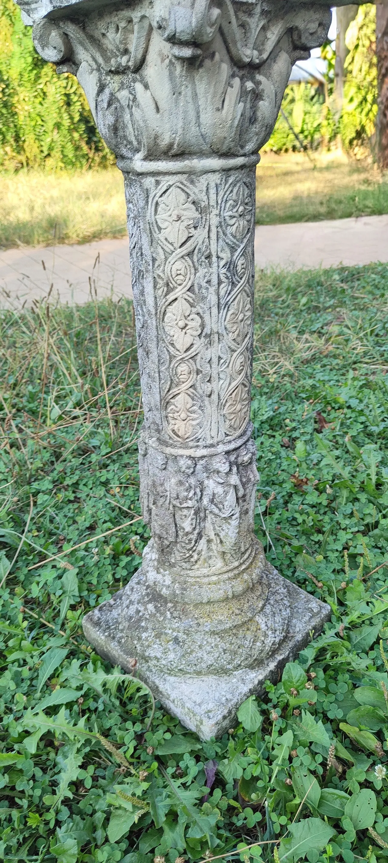 Statue with column, 1960s 14