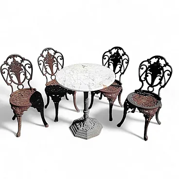 Garden table with cast iron chairs, 20th century