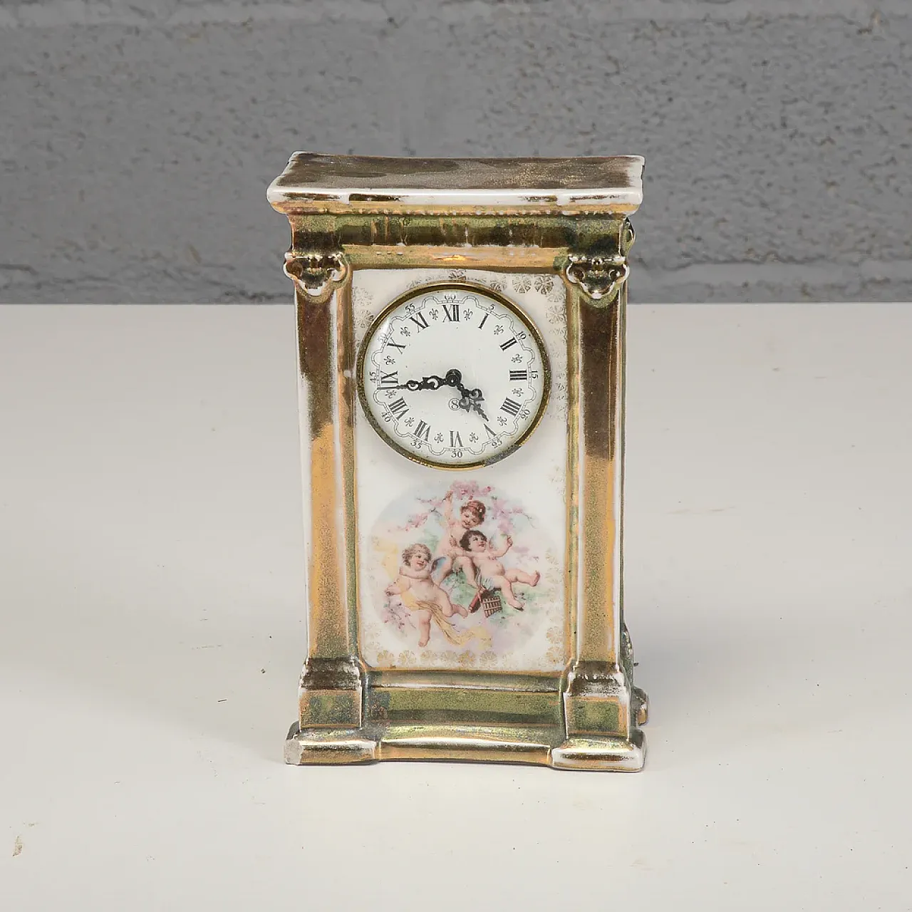 Lacquered ceramic side clock, 19th century 1