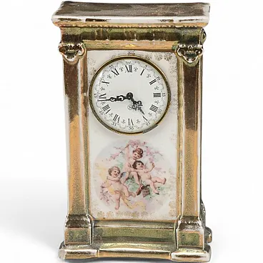 Lacquered ceramic side clock, 19th century