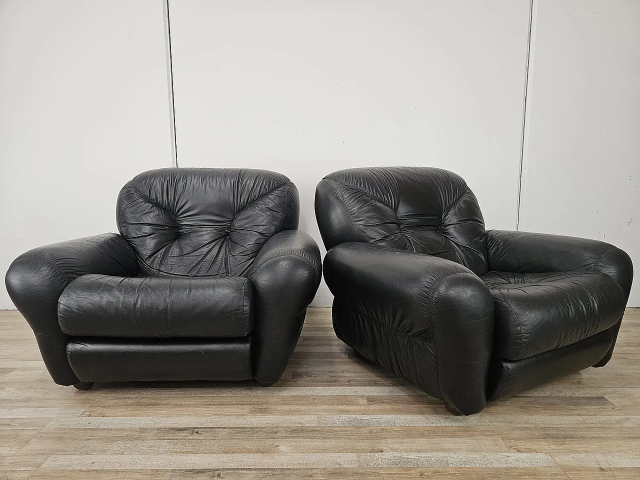 Black leather club chairs 1
