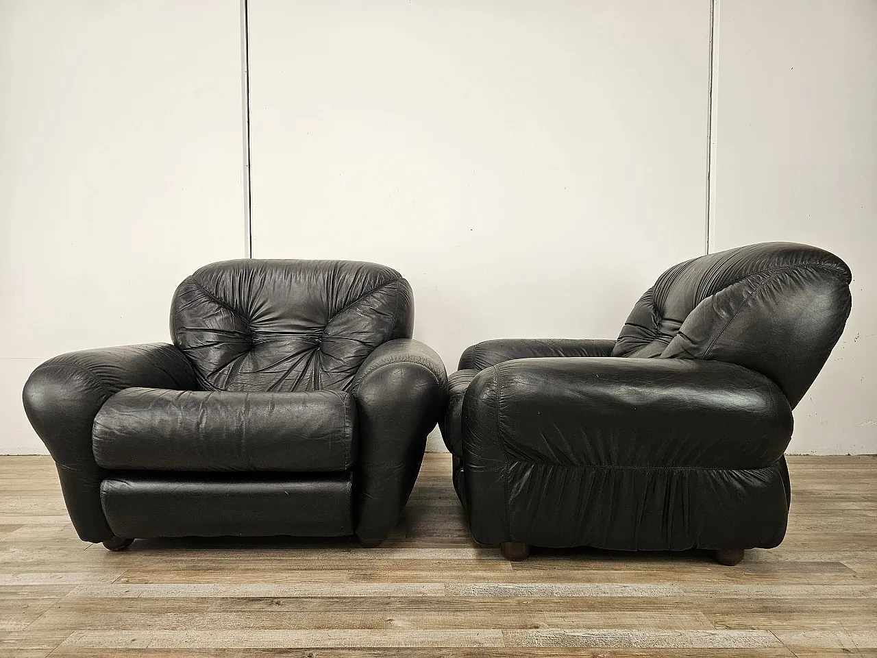 Black leather club chairs 4