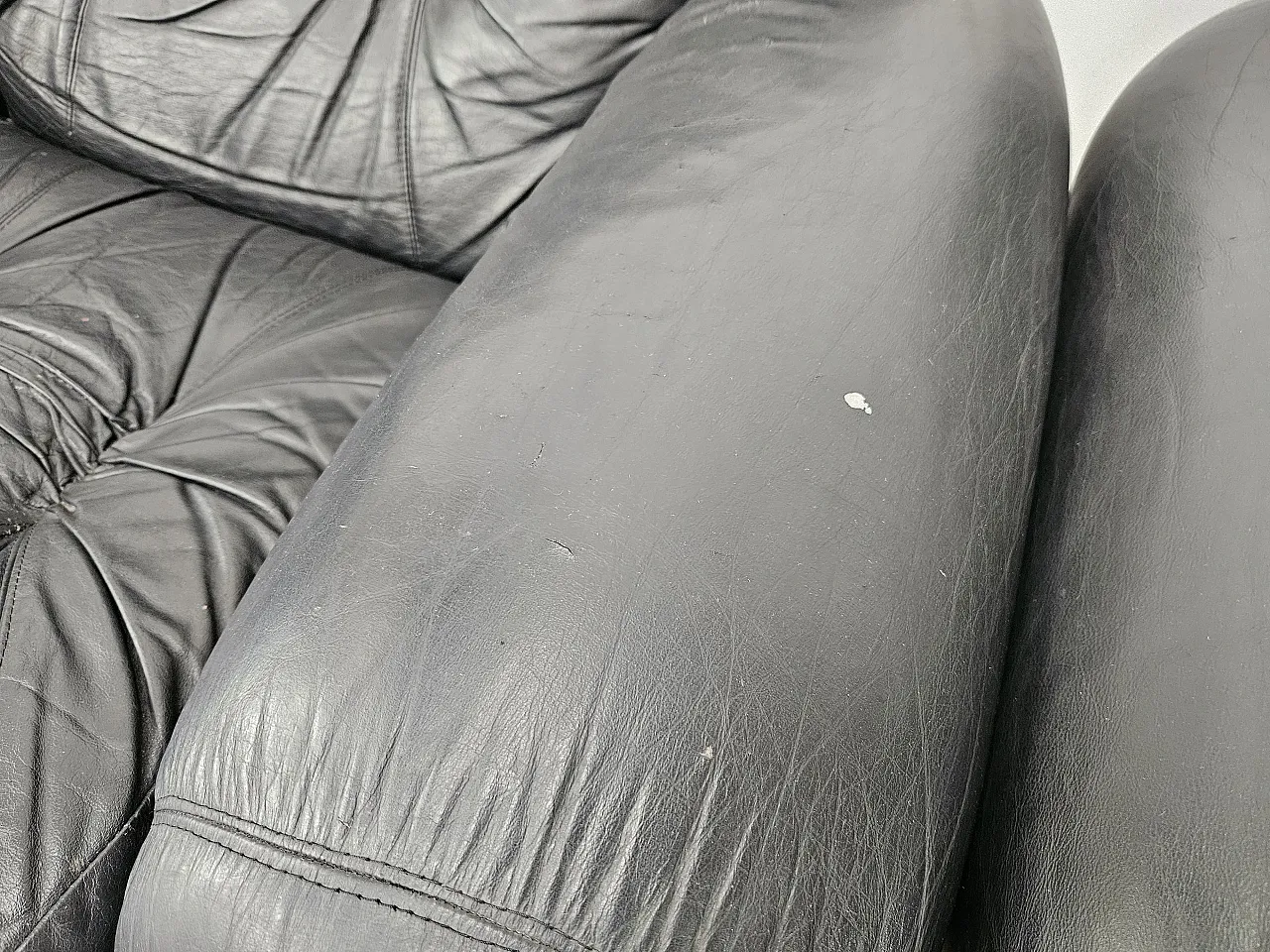 Black leather club chairs 10