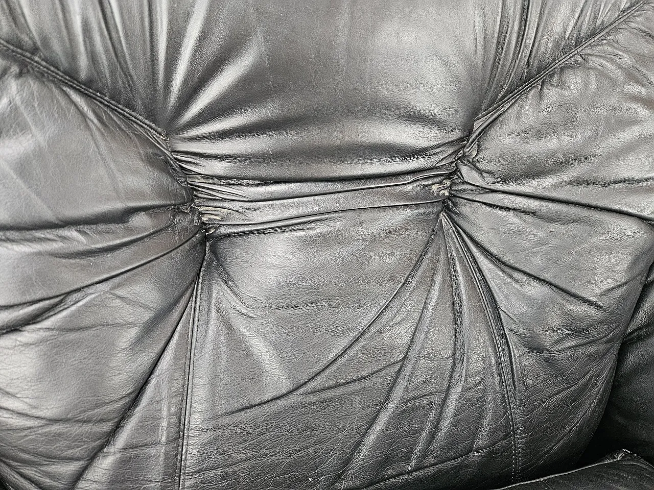 Black leather club chairs 13