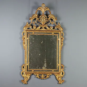 Wall mirror in carved and gilded wood, 18th century
