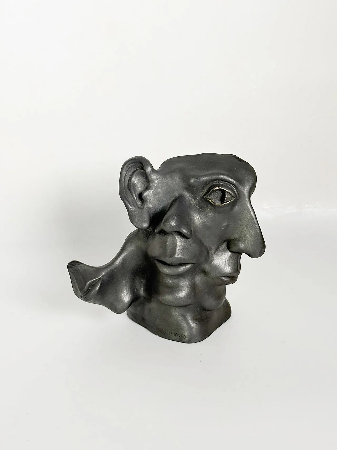 Patinated terracotta sculpture with multiple faces, 1960s 2