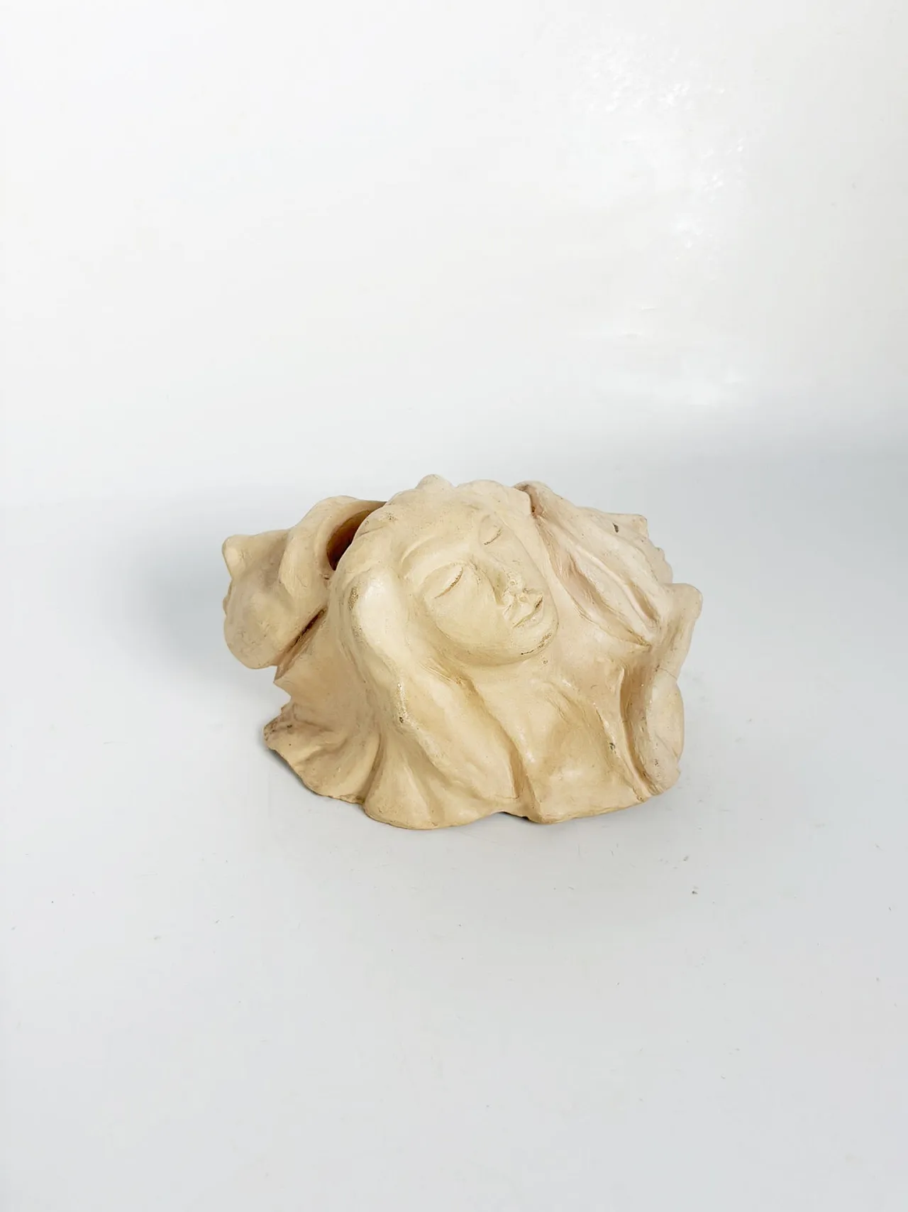 Raw clay sculpture with faces, 1980s 2