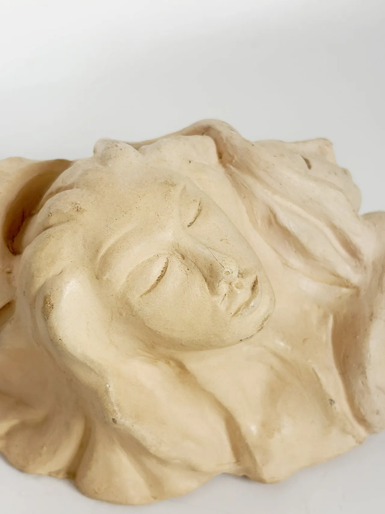 Raw clay sculpture with faces, 1980s 4