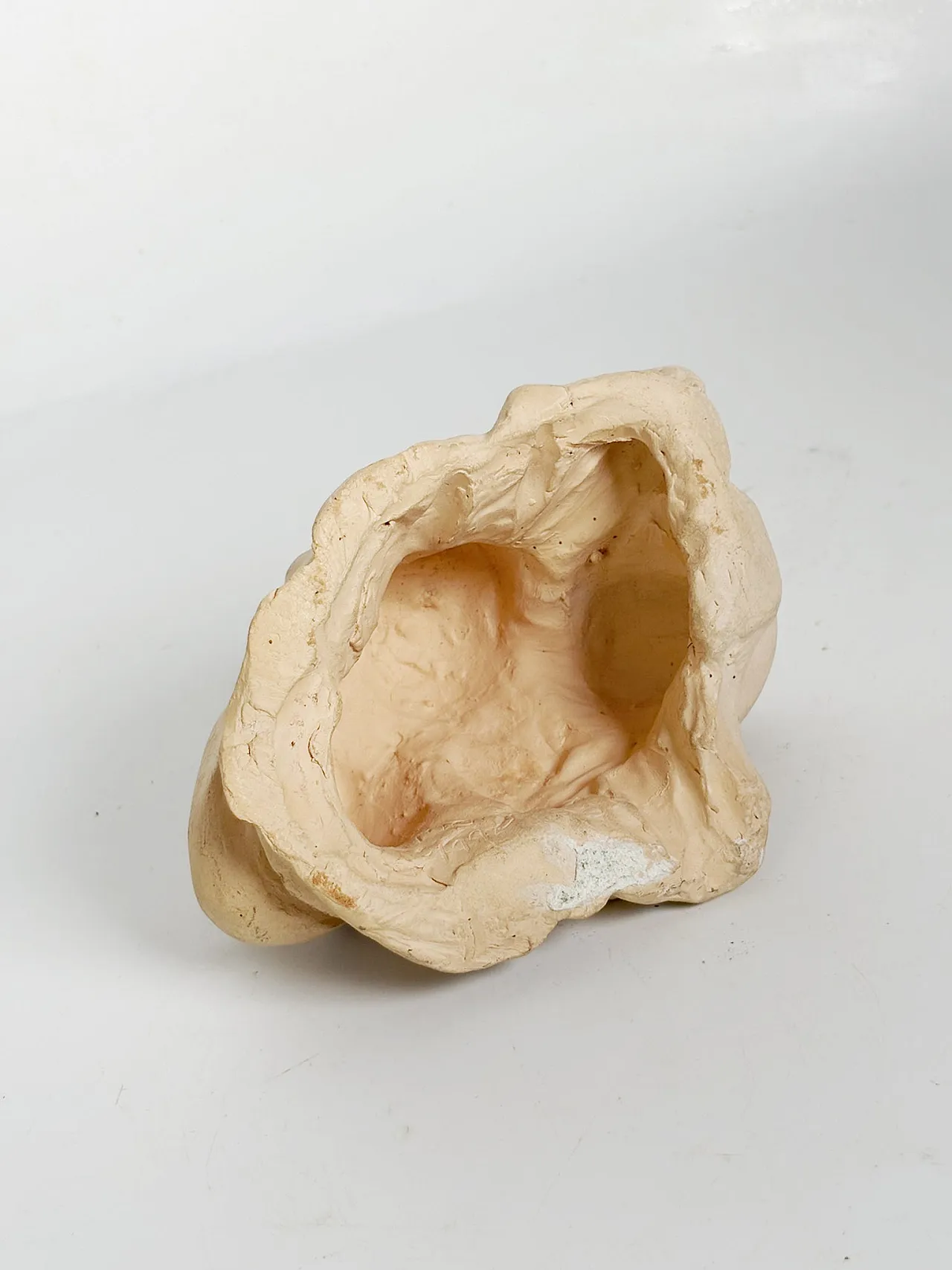 Raw clay sculpture with faces, 1980s 6