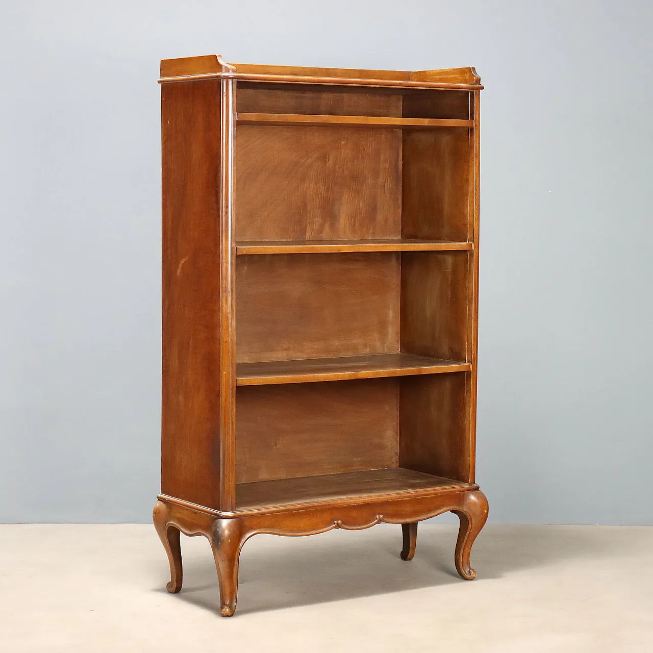 Open walnut bookcase with balustrade, 20th century 1