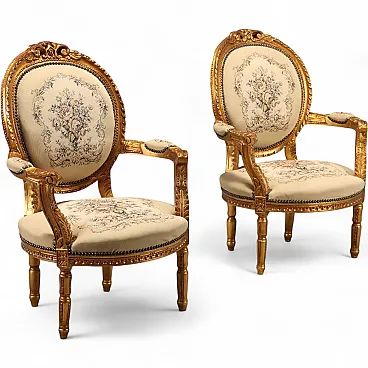 Pair of golden Neoclassical style armchairs, early 20th century