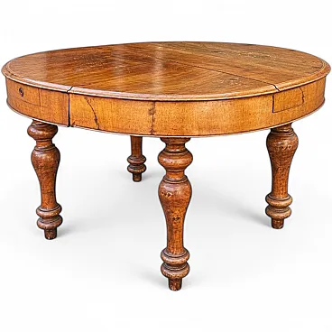 Extendable oval wooden table, 19th century