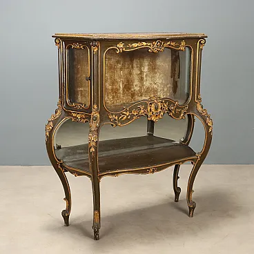 Carved and lacquered Baroque style showcase, 19th century