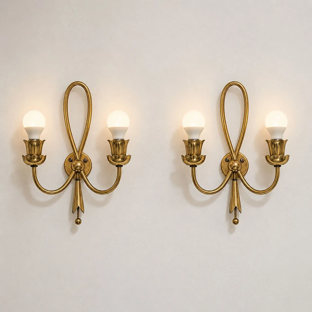 Pair of brass wall lamps by Angelo Lelii for Arredoluce, 50s 1