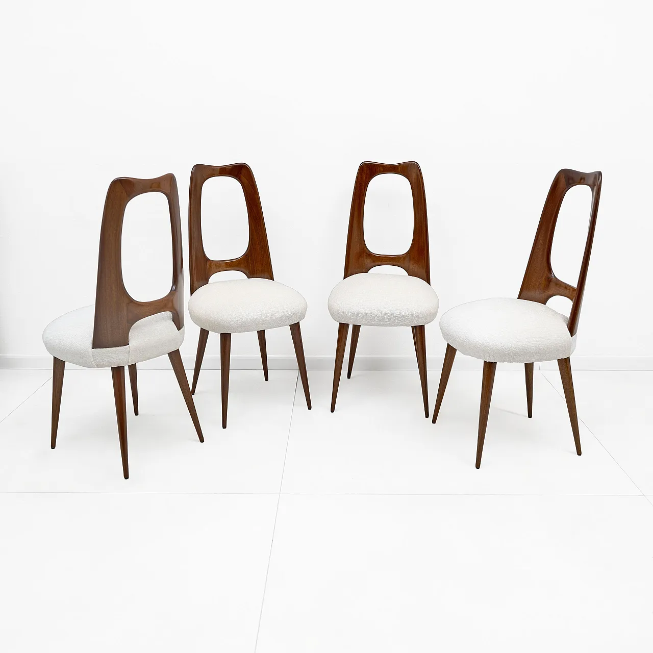 Four mid-century Italian walnut dining chairs, 1950 1