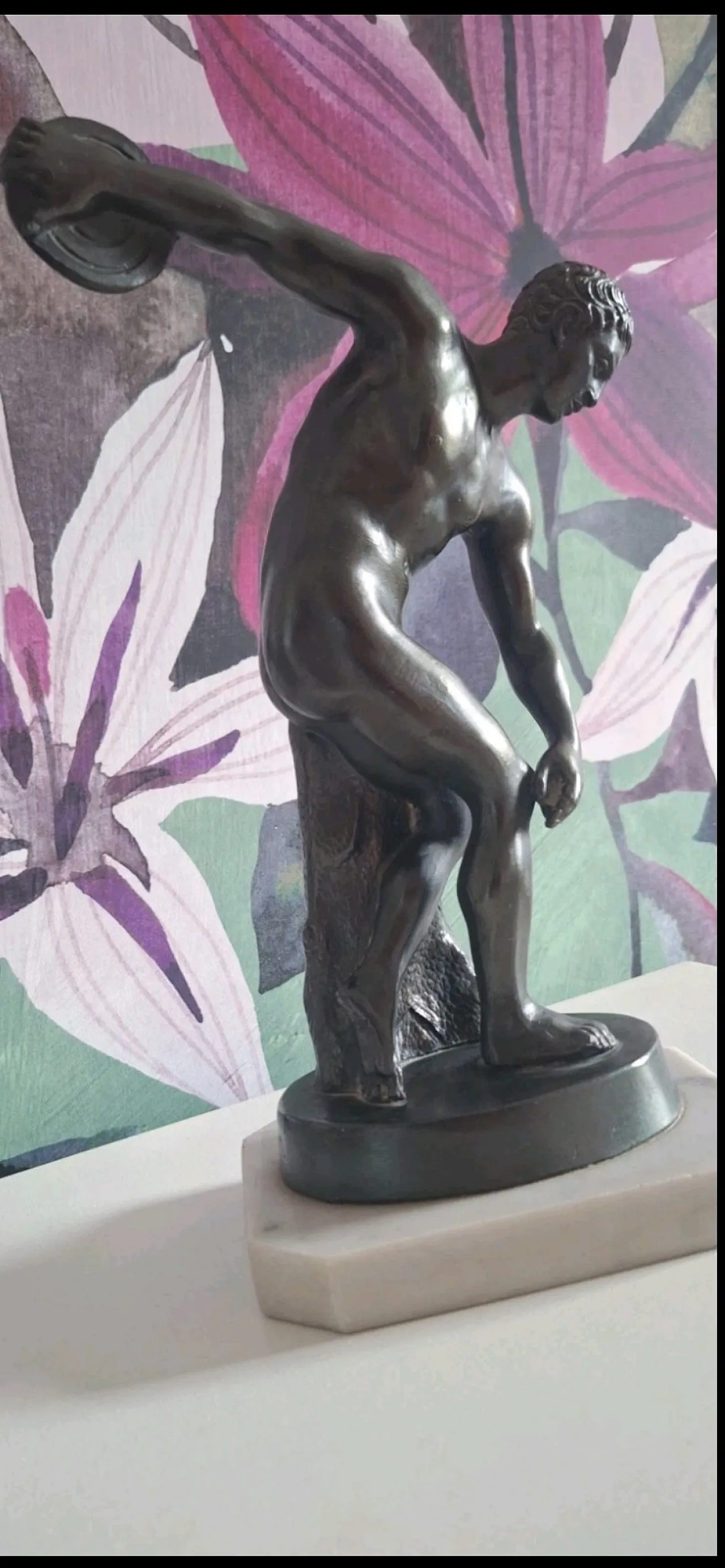 Ancient sculpture of a Discopolo di Mirone in burnished metal on a marble base 1