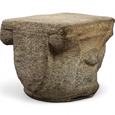 Granite capital with carvings of volutes and shields, 18th century