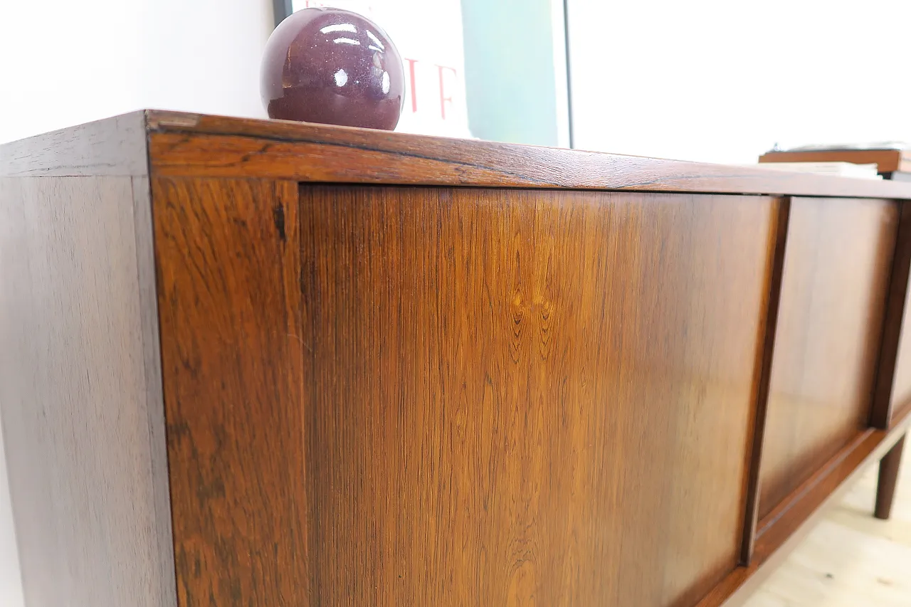 Rosewood sideboard with sliding doors, 1960s 12