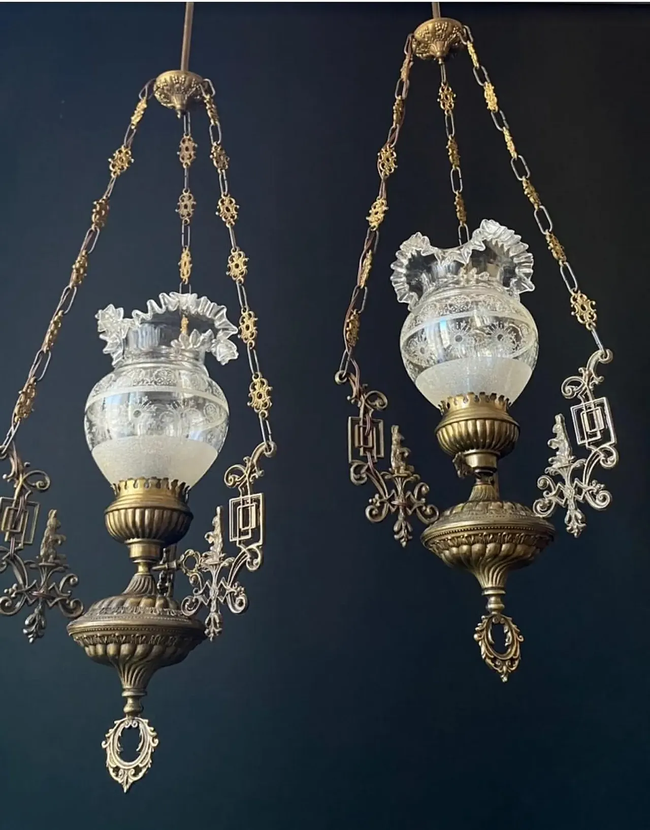 Pair of chandeliers are made of brass and bronze, 20th century 1