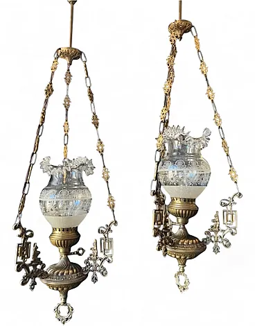 Pair of chandeliers are made of brass and bronze, 20th century