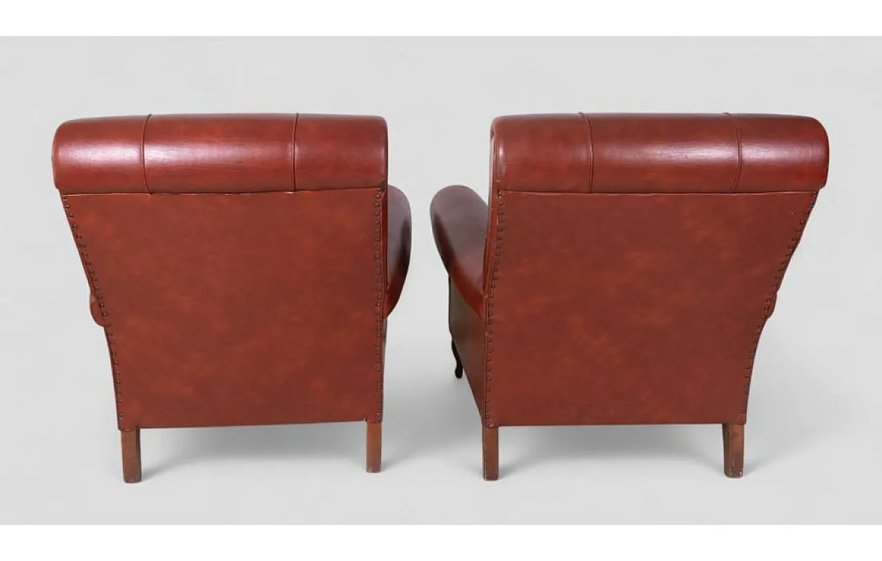 Pair of burgundy leather chairs, 1960s 5